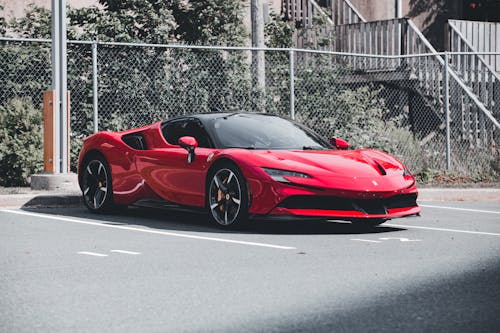 Бесплатное стоковое фото с Ferrari, автостоянка, красный автомобиль