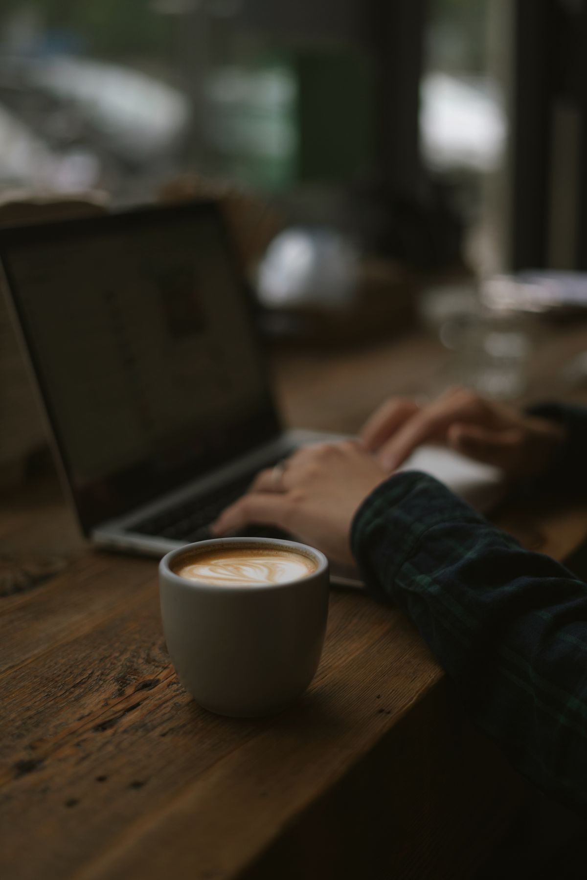 Hands on a laptop keyboard — learning ChatGPT starts with good prompting