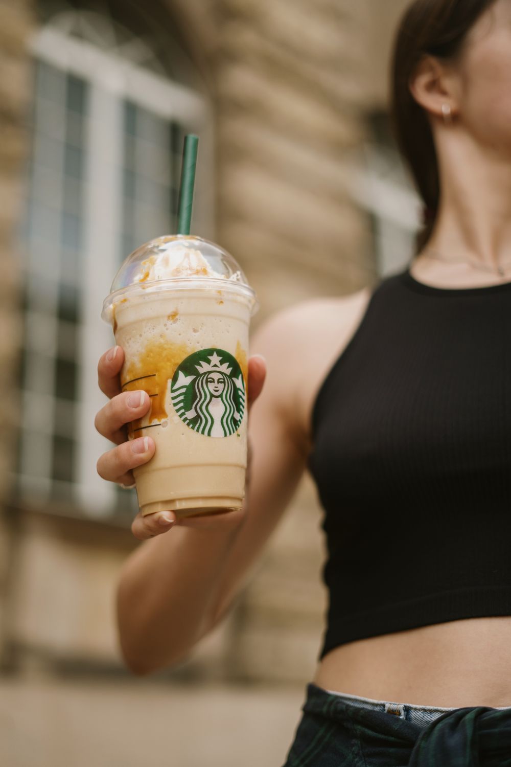 Woman Holding Starbucks Coffee Free Stock Photo woman-holding-starbucks-coffee-free-stock-photo
