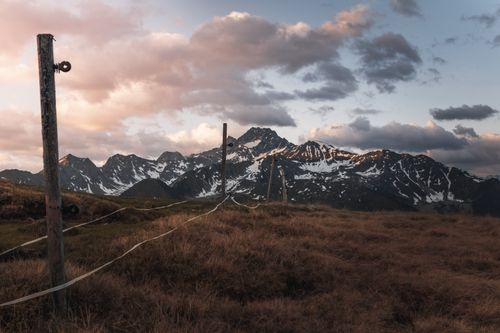 Free Explore the stunning mountain landscape in Tyrol, Austria with dramatic clouds at sunset. Stock Photo