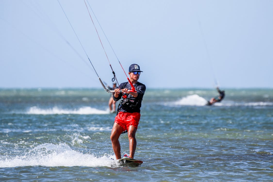 Man Windsurfing at Sea