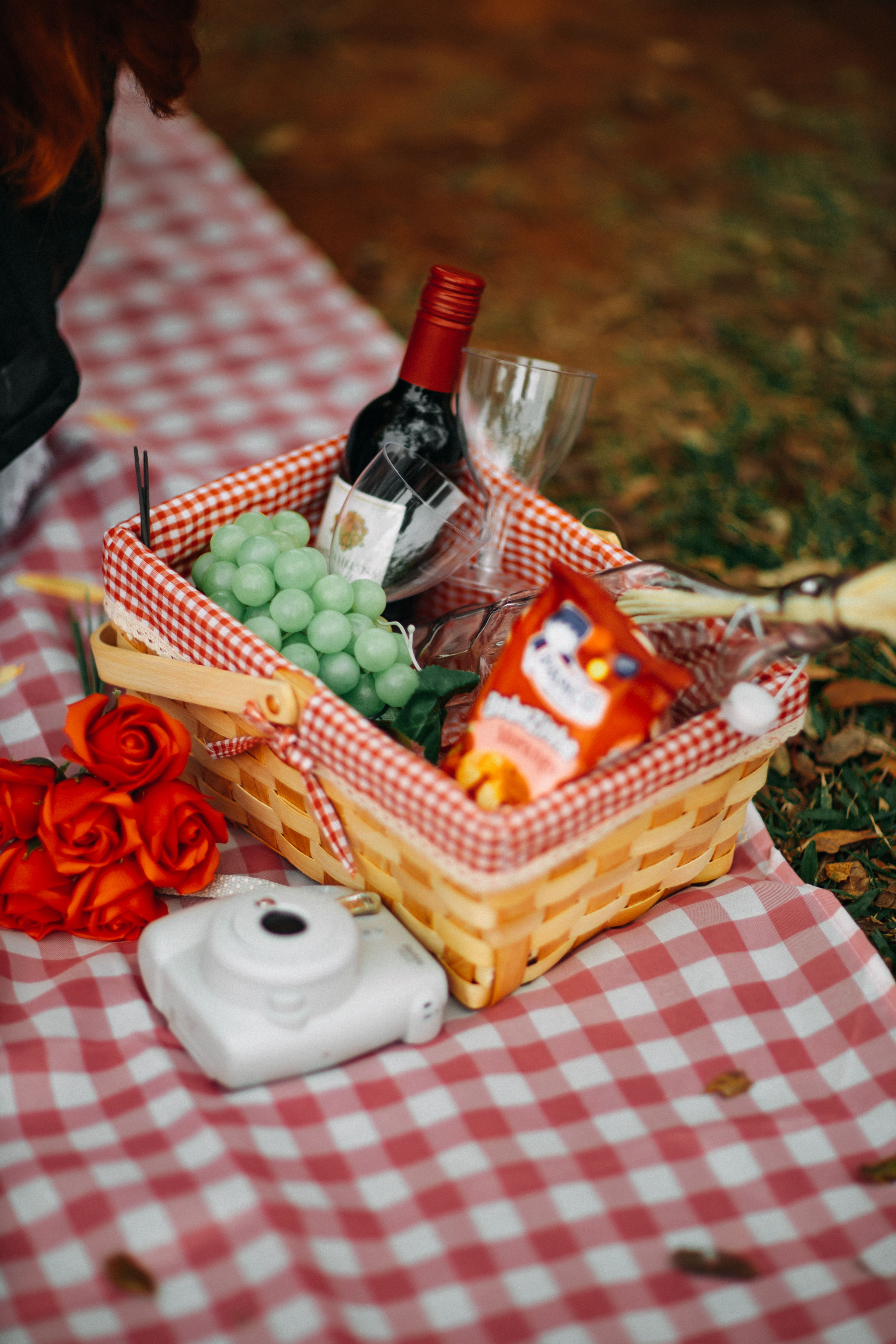 Wine and Food in a Picnic Basket · Free Stock Photo