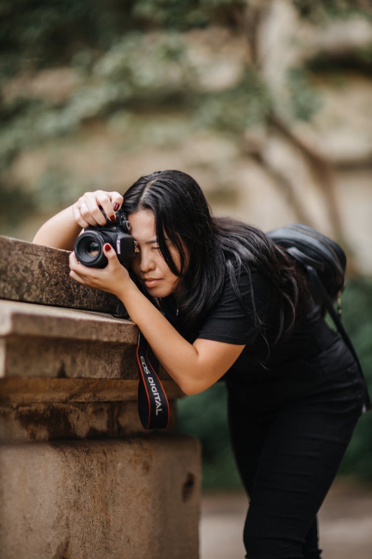 Woman Photographer Taking Picture