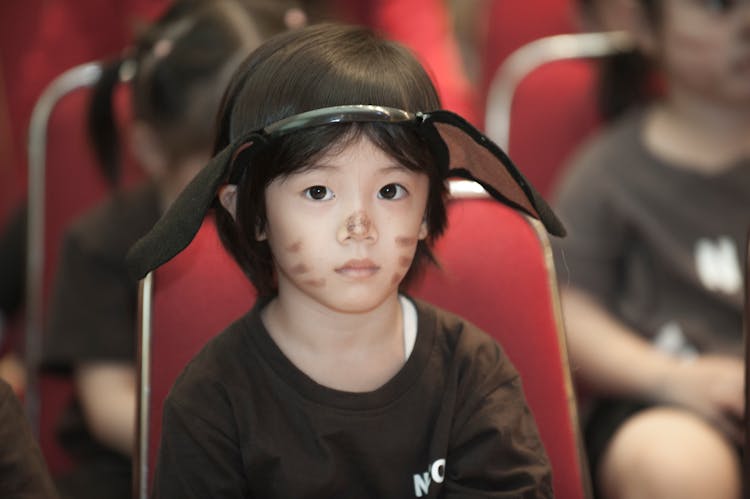 Boy In Black Crew Neck Shirt Wearing Costume Headband