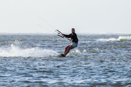 A Man Wakeboarding on the Sea