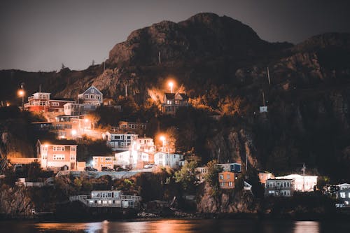 Lights on Houses on a Hill at Night