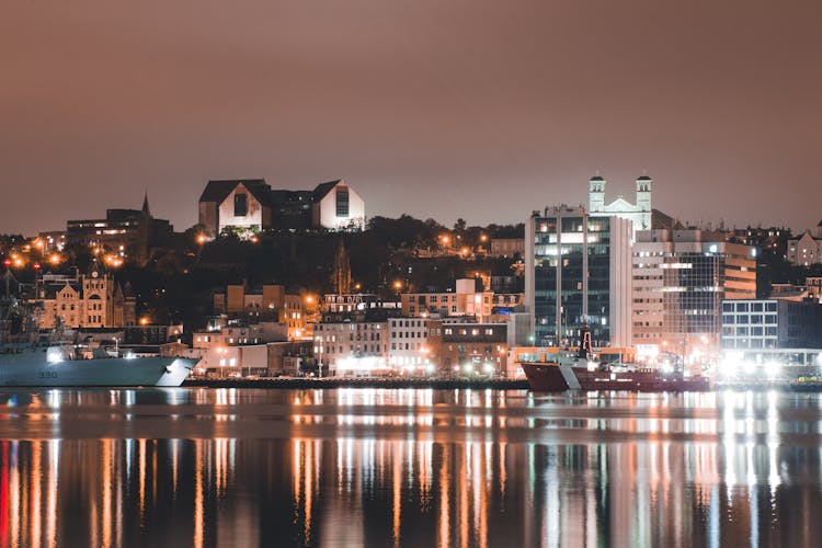 Illuminated City With Waterfront