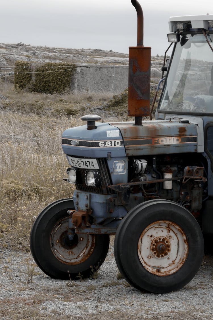 Gray Tractor In The Farm