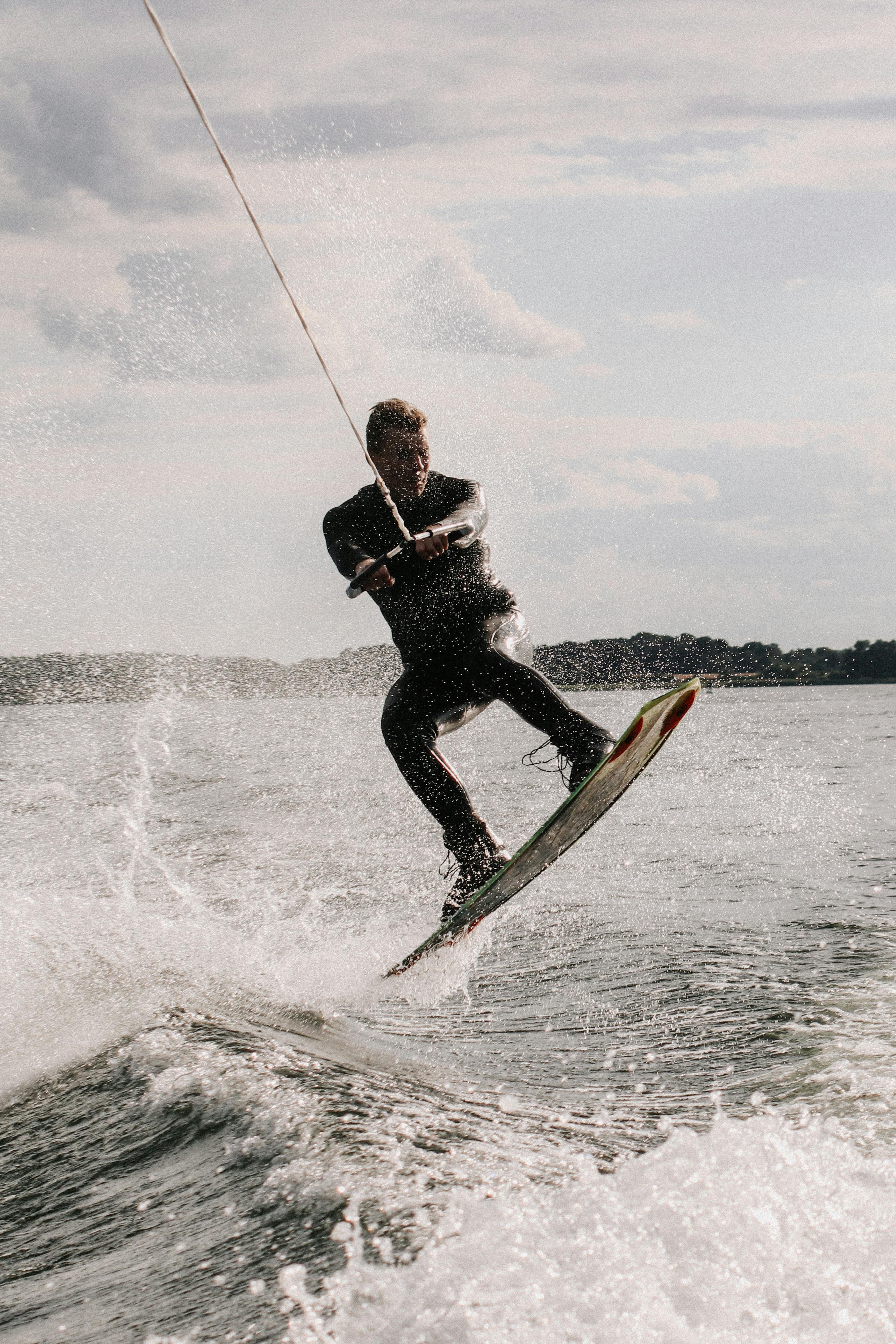 Man in Wetsuit Wakeboarding · Free Stock Photo