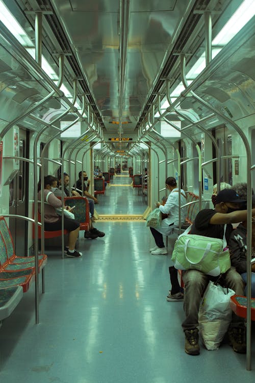 Free People Sitting on Train Seat Stock Photo