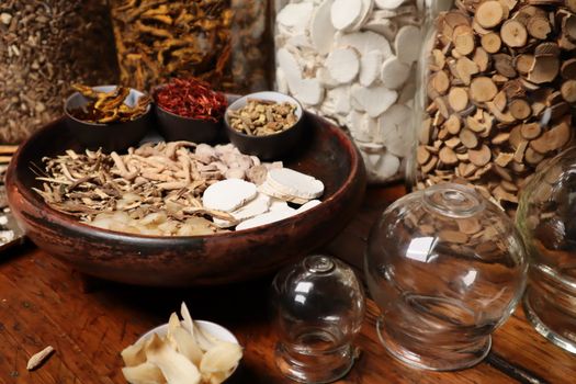 various dried herbs in bowls