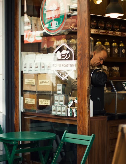 Man Standing Inside a Coffee Shop