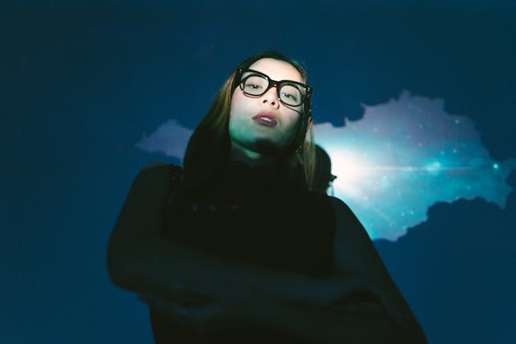 Woman In Studio, Wearing Eyeglasses