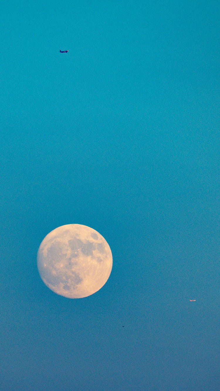 Full Moon Over Blue Sky