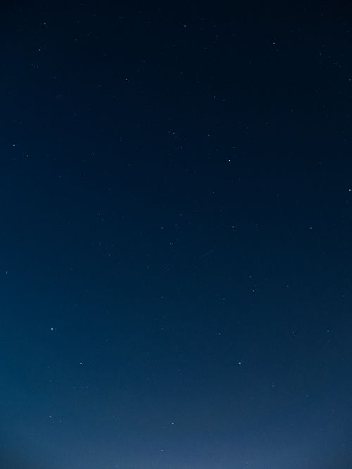 Free A stunning view of a star-studded night sky with visible constellations. Stock Photo