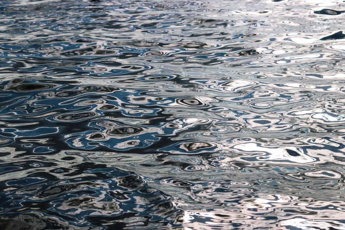 Reflections of Water Surface ยท Free Stock Photo