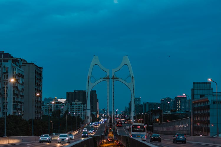 Traffic On Bridge In City At Night