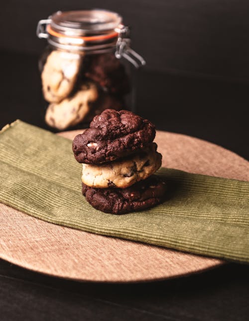 Stack of Chocolate Chip Cookies on Brown Wooden Board