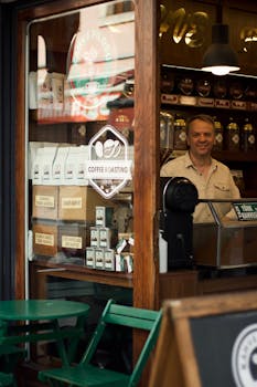 Friendly barista in cozy coffee shop offering freshly roasted coffee beans.