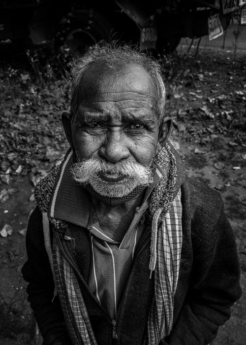 Free Black-and-white portrait of an elderly Indian man with a distinctive mustache. Captivating expression. Stock Photo