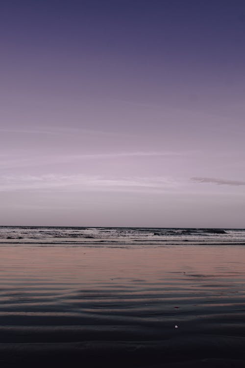 Beach Under Purple Sky