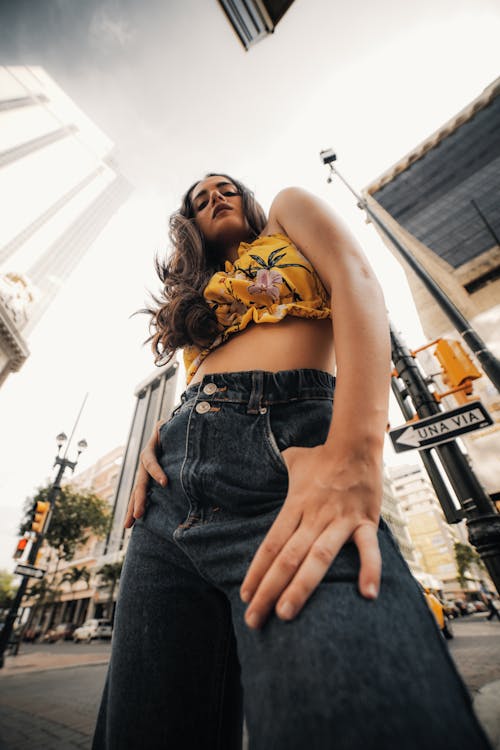 Low Angle Shot of a Woman in Crop Top