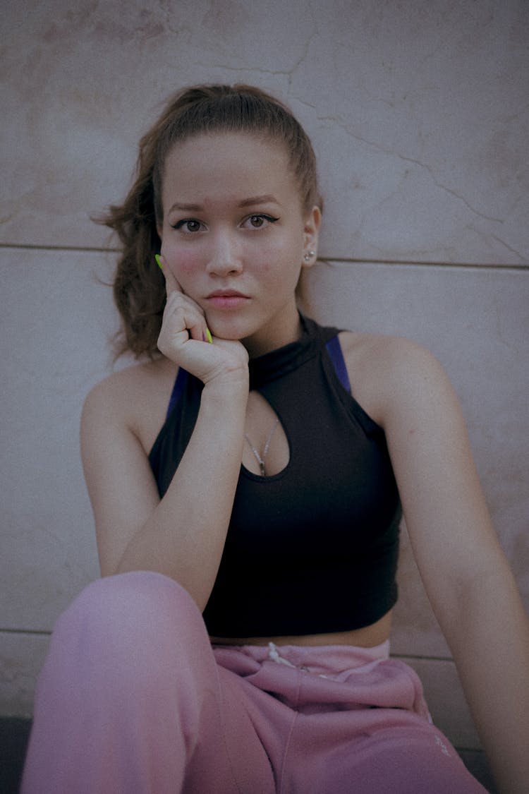 Portrait Of A Girl In A Black Sleeveless Top