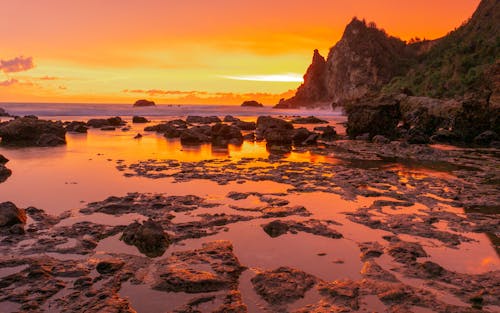 Immagine gratuita di cielo arancione, crepuscolo, litorale
