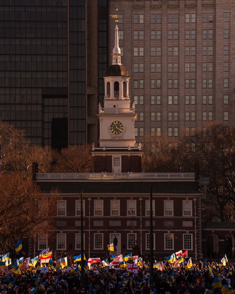 People With Flags On City Street