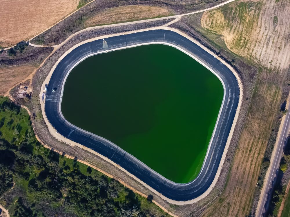 Bird s Eye View Of Water Reservoir For Irrigation In Agriculture Free bird-s-eye-view-of-water-reservoir-for-irrigation-in-agriculture-free