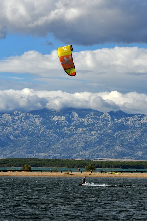 kite surfers on summer beach