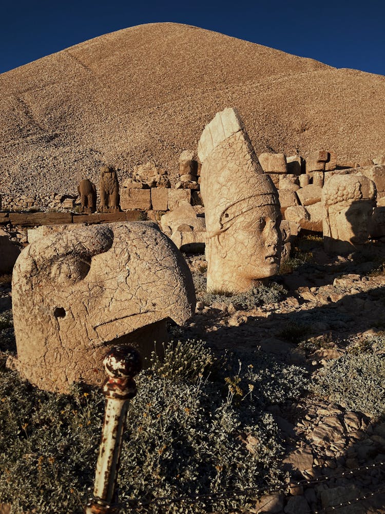 Artifacts Beside A Mountain