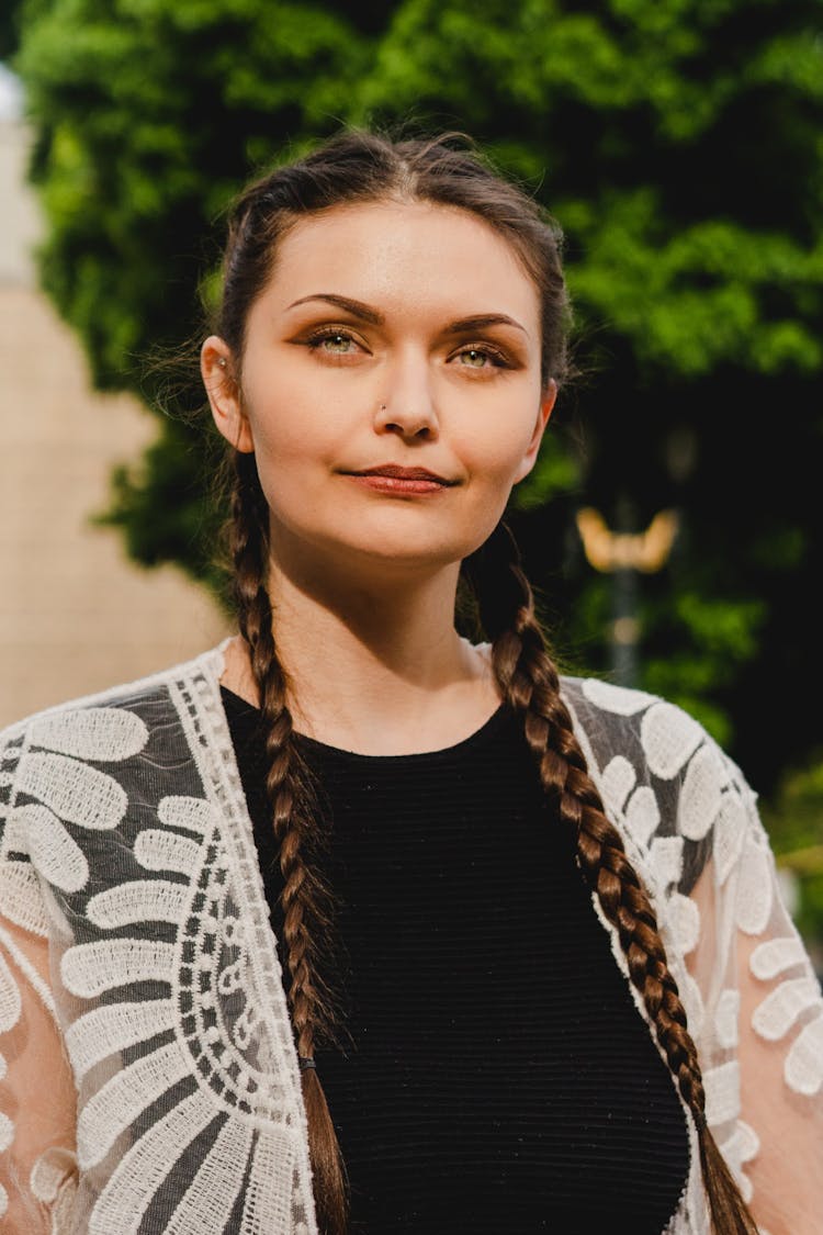 Portrait Of Woman With Long Braids