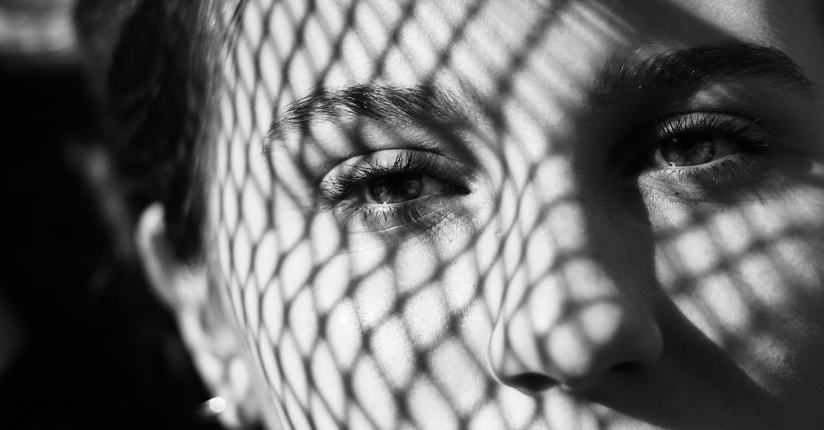 Close Up Photo of a Woman Staring · Free Stock Photo