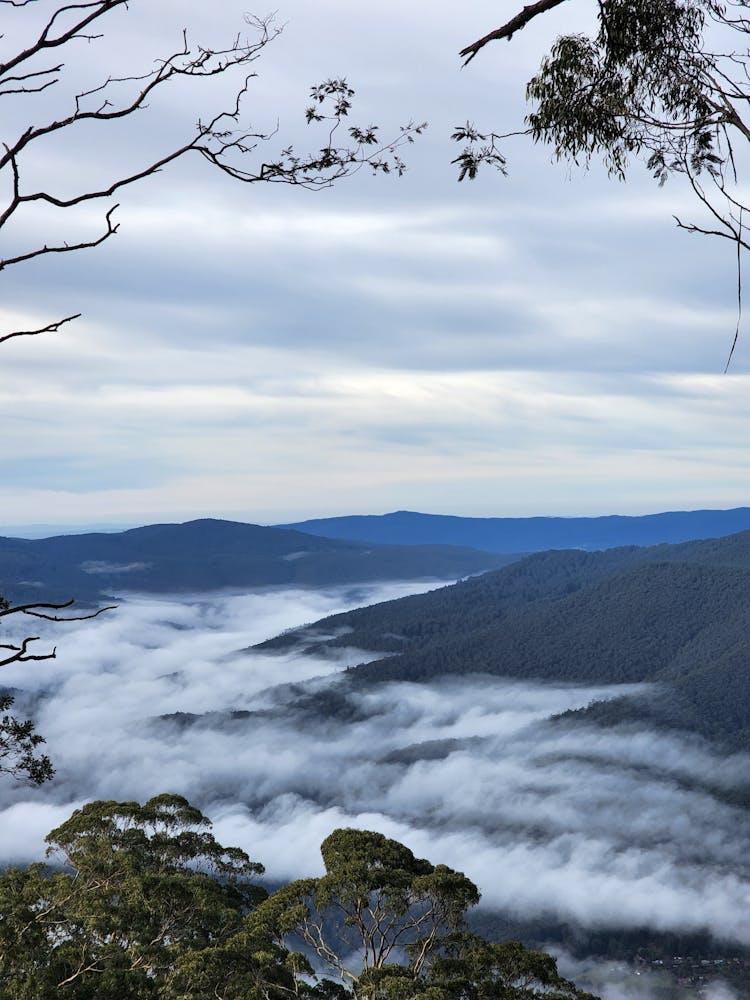 High Angle Shot Of Foggy Mountains