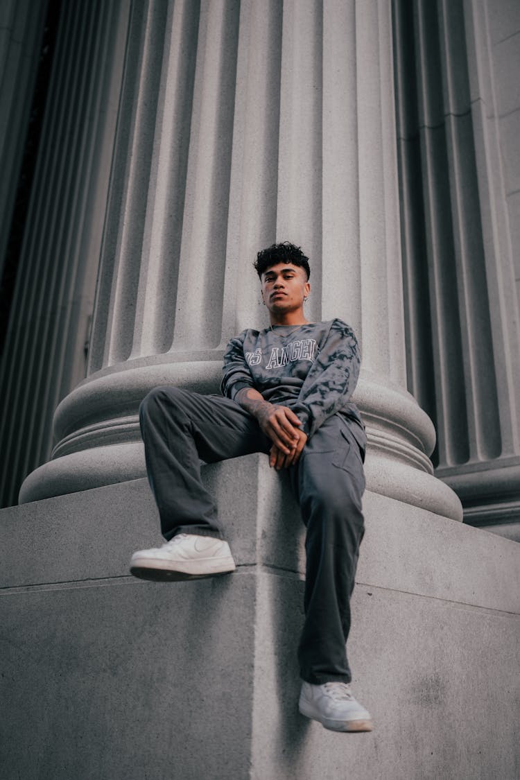 Portrait Of A Young Man In Urban Style Clothing