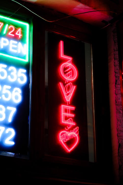 Free Love Neon in Window Stock Photo
