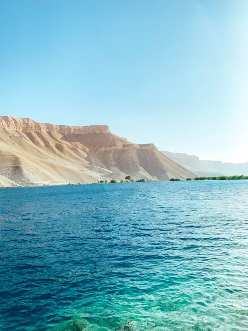 Бесплатное стоковое фото с вертикальный выстрел, голубая вода, голубое море