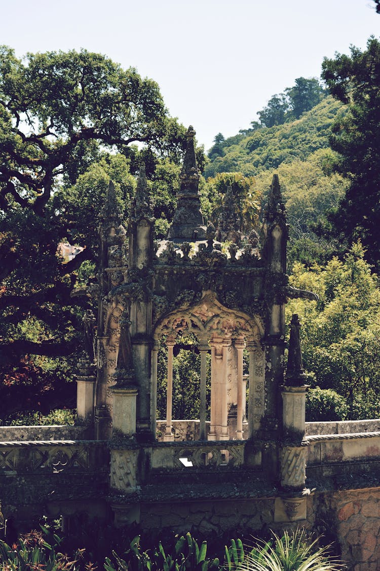 An Old Building In A Garden