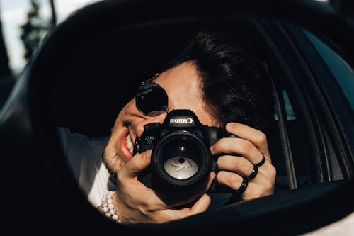 Man Holding a Camera