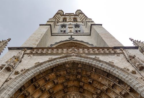 Free Explore the intricate details of a gothic church facade from a low angle perspective, capturing its architectural beauty. Stock Photo