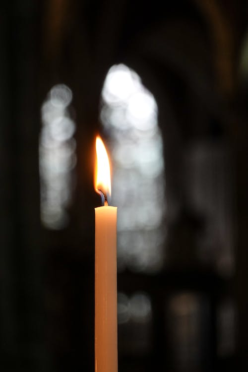 A Close-up Shot of a Lighted Candle