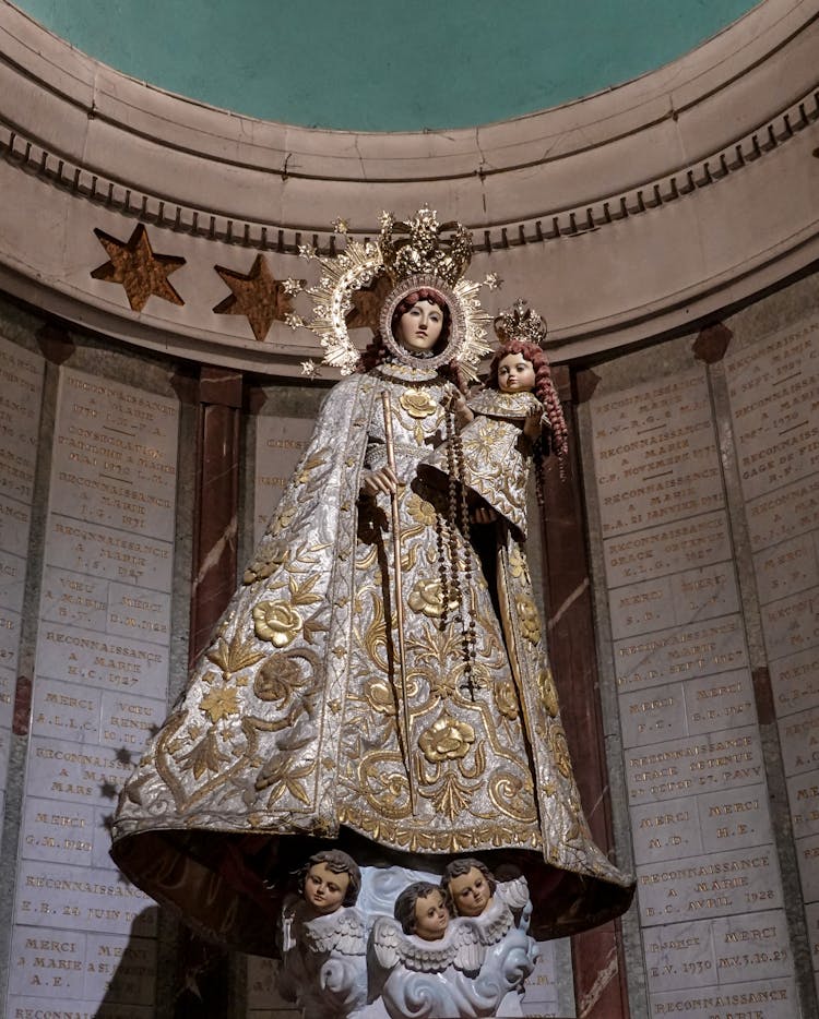 Statue Of Virgin Mary With Angels