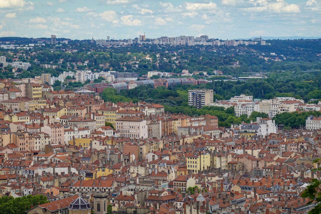 aerial cityscape of lyon showcasing dense historic architecture and lu