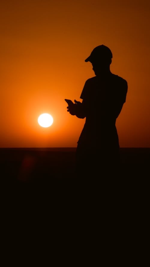 Kostnadsfri bild av bakgrundsbelyst, mörk, person