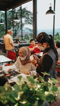 A waitress assists a customer with a food order in a cozy indoor restaurant setting, showcasing personal service.