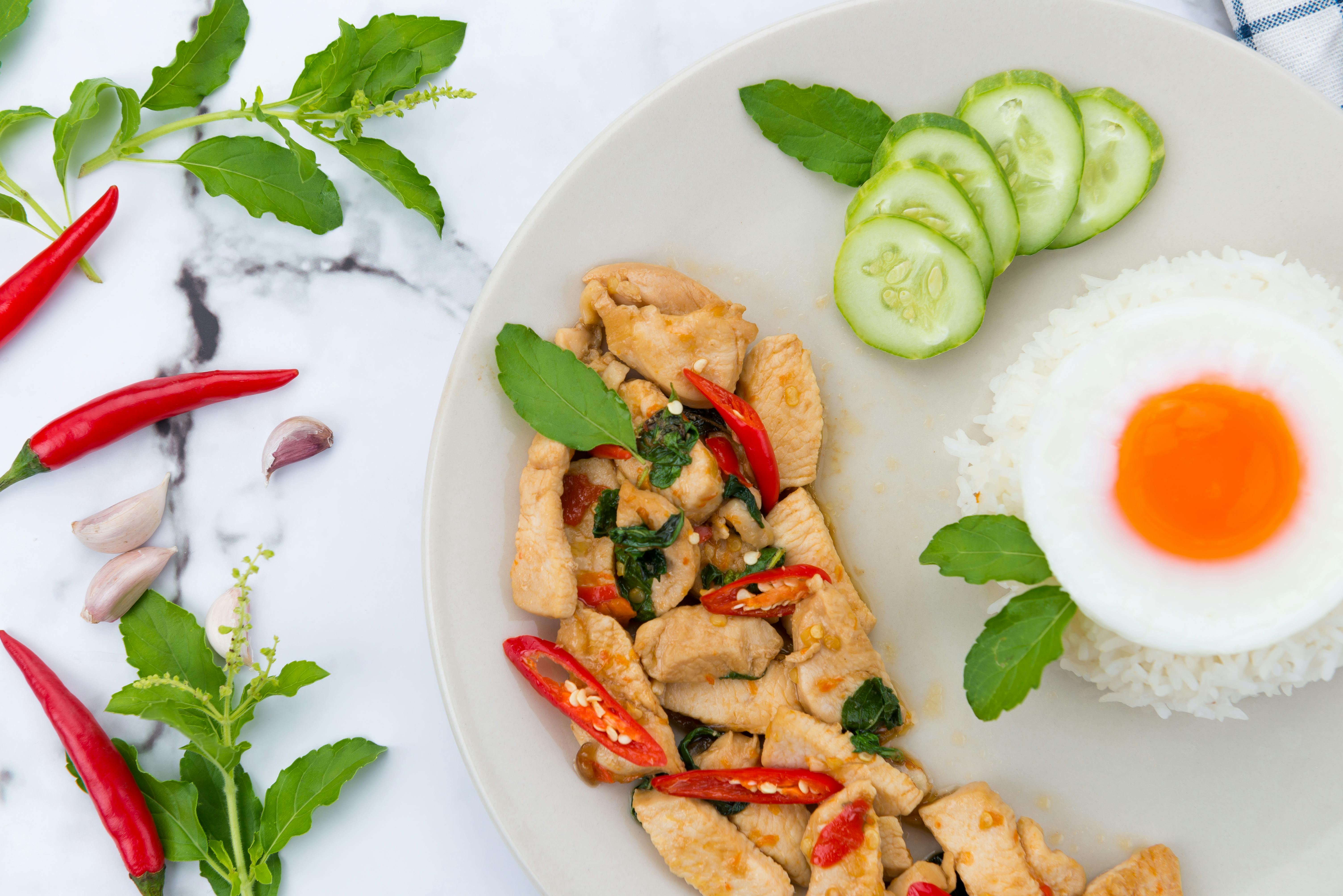 Crunchy Samosa over a Ceramic Plate · Free Stock Photo