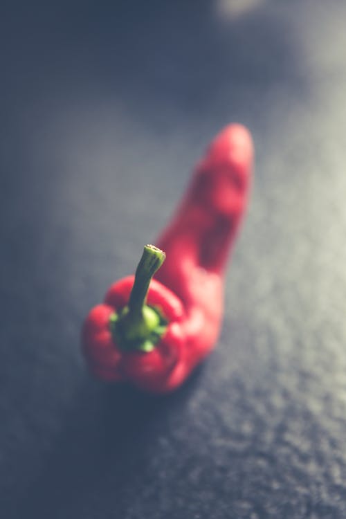 Red Bell Pepper on Gray Textile