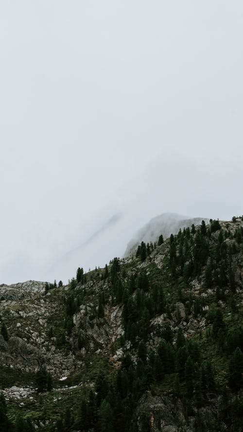 Photo of a Mountain under White Sky