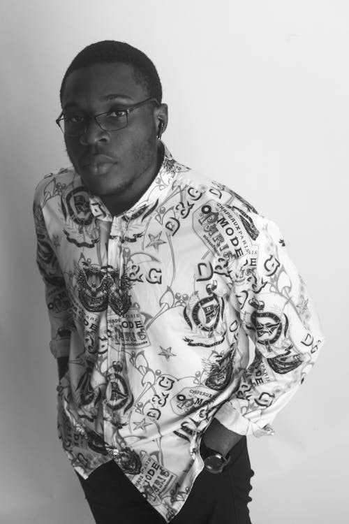 Free Black and White Photo of a Man Wearing a Printed Long Sleeves Stock Photo